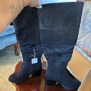 Tall high heel black boots